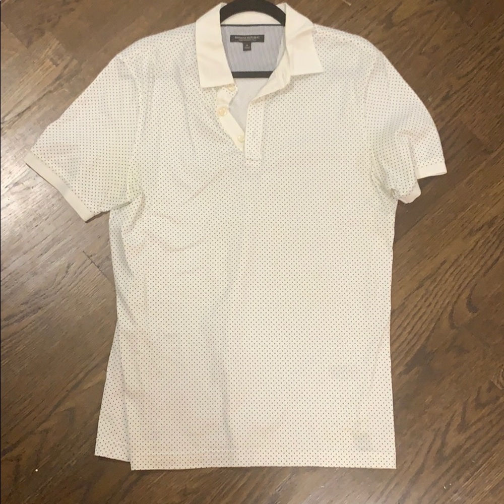 Polka dot polo in white with navy dots